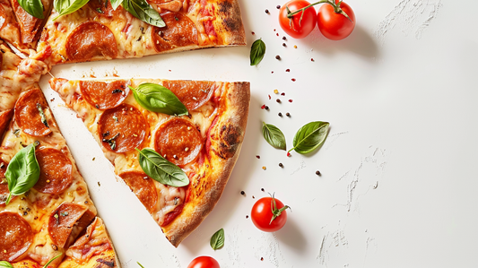 Slice of Margherita pizza showing the layers of tomato sauce, melted mozzarella, and a sprinkle of basil, highlighting the classic Italian dish.